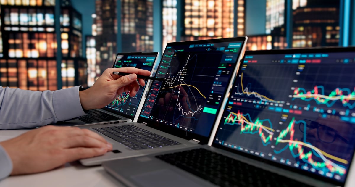Monitoring market trends and making strategic trades — stockbroker at work